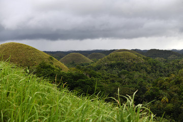 view of the chocolate hills on bohol island in the philippines