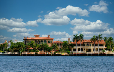 Fototapeta na wymiar Huge mansion on the coast of a canal