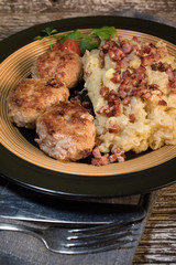 Minced meat cutlets with boiled sauerkraut.