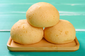 side view sweet puffs on a green table