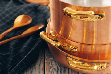 New copper cookware for professional kitchen close up