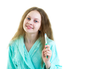 A little girl brushes her teeth.Isolated on white background.