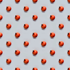 Photographic collage - pomegranate on gray background. Seamless pattern.