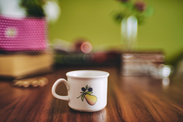 cup of tea on a elegant wooden table