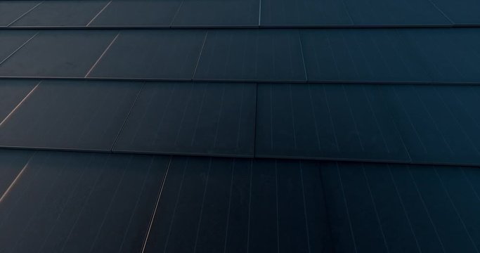 Black solar roof concept. Building-integrated photovoltaics system consisting of modern monocrystal black solar roof tiles. 3d rendering video.