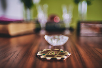 arabic coasters on a elegant wooden table