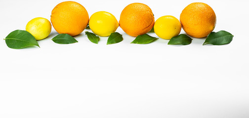 oranges and lemons on wooden table