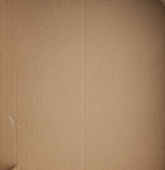piece of smooth brown cardboard paper, full frame