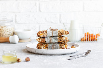 Homemade granola bars with pumpkin seeds and dried apricots.
