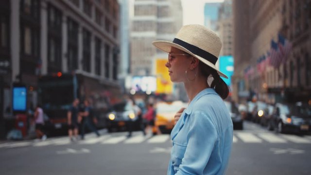 Attractive tourist in a hat in New York City