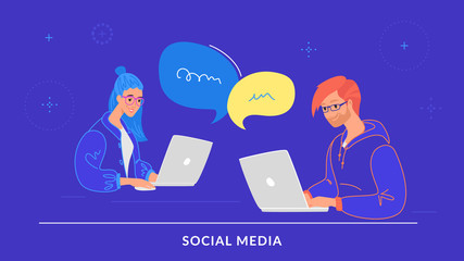 Young couple chatting together in social media using laptop at work desk