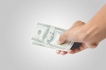 Hands holding money isolated on a white background. Isolated on white with clipping path.