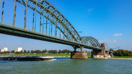 A tanker sails on the Rhine under the South Bridge in Cologne, Germany