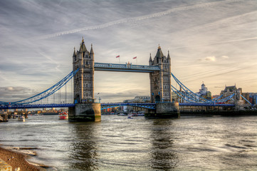 Tower Bridge in London, the UK - one of English symbols. Golden hour time with beautiful sky. HDR photography.