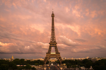 Fototapeta na wymiar Beautiful view of famous Eiffel Tower in Paris at sunsey before twilight, France. Paris Best Destinations in Europe.