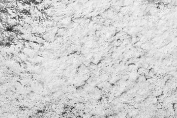 The surface. The asphalt is black.