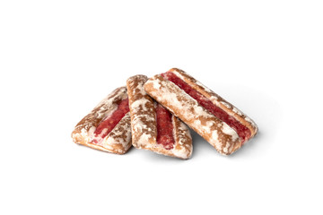 Traditional Russian gingerbread with cherry or raspberry filling isolated on white background.