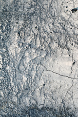 The surface. The asphalt is black.