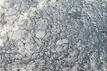 The surface. The asphalt is black.