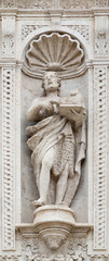 ACIREALE, ITALY - APRIL 11, 2018: The statue of St. John the Baptist on the facade of Basilica Collegiata di San Sebastiano designed by Angelo Bellofiore 18. cent.