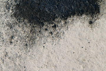 The surface. The asphalt is black.