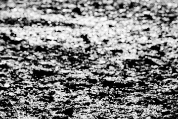 The surface. The asphalt is black.