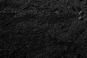 The surface. The asphalt is black.