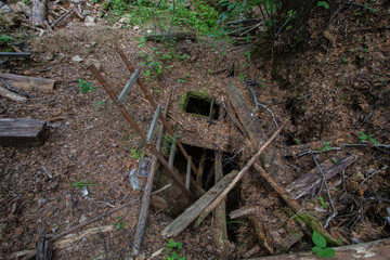 Old abandoned amethyst mine in forest