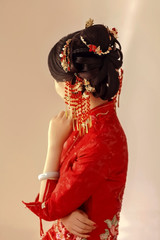 Asian girl in red chinese traditional costume