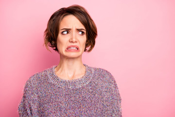 Close-up portrait of her she nice attractive lovely pretty brown-haired girl unpleasant look reaction grimacing isolated over pink pastel color background - obrazy, fototapety, plakaty
