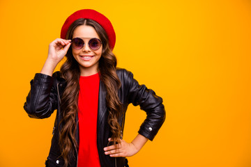 Close-up portrait of her she nice attractive charming lovely pretty fashionista cheerful cheery long-haired girl posing touching specs isolated over bright vivid shine vibrant yellow color background