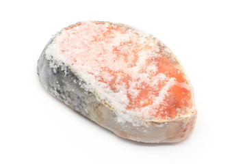 Frozen raw steak salmon isolated on white background