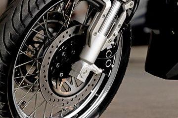 Brake system and front suspension of the motorcycle