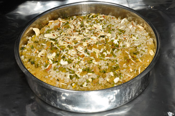 Native dish Gund pak pudding at Indian wedding