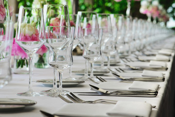 row of glasses on the decorated table