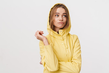 Photo of confused caucasian woman posing and looking aside