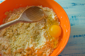 The egg is added to the dough.