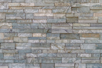 Natural stone wall backgraund, rock tiles texture