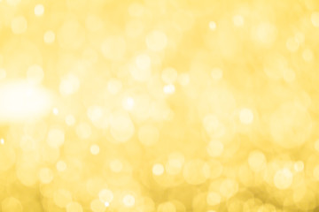 Abstract yellow bokeh of blurry lights background