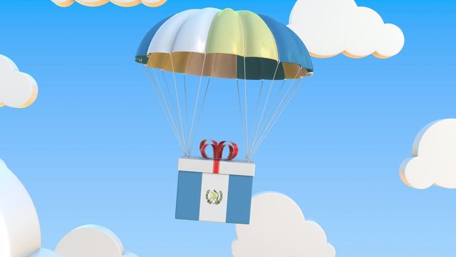 Box with national flag of Guatemala falls with a parachute. Loopable conceptual 3D animation