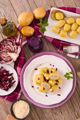 Potato gnocchi stuffed with radicchio and ricotta.