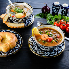 set of soups in a bowl, a traditional oriental soup in a bowl