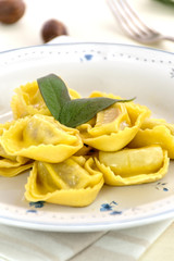 Cappellacci with pumpkin, typical homemade fresh pasta of Ferrara, Emilia-Romagna, Italy.