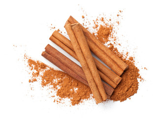 Cinnamon Sticks And Powder Isolated On White