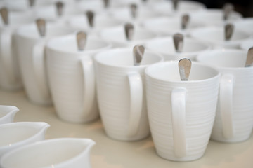Group of empty white ceramic cups