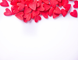 Valentines day background with red heart shaped candies
