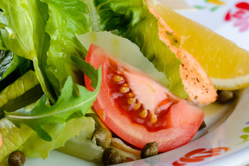 fresh salad with tomato close-up