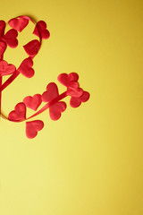 Valentine's day, a Declaration of love.Tree of love from a heart and a ribbon. Yellow background.