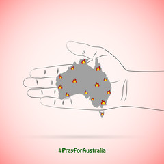 Naklejka premium Hand hold a map of Australia in wildfires .