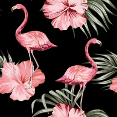 Washable wall murals Flamingo Tropical pink hibiscus and flamingo floral green palm leaves seamless pattern black background. Exotic jungle wallpaper.